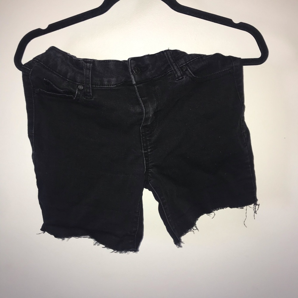 frayed black shorts